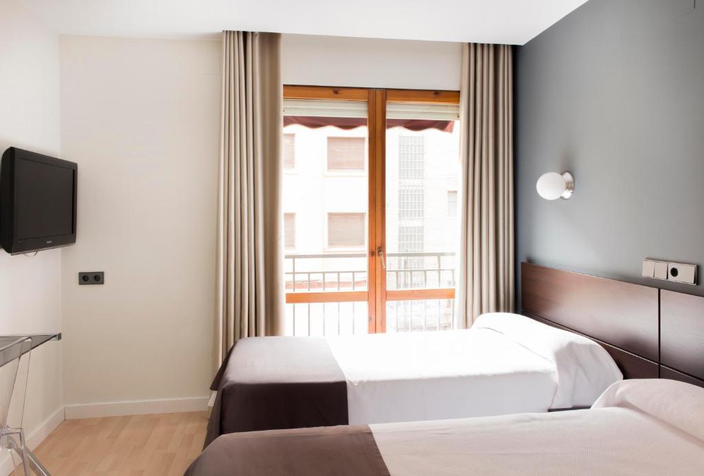 Hospedium Hostal Un Punto Chic 韦斯卡 外观 照片